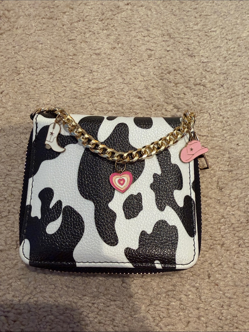 Claire’s Black and White Cow Print wallet with Gold Chain